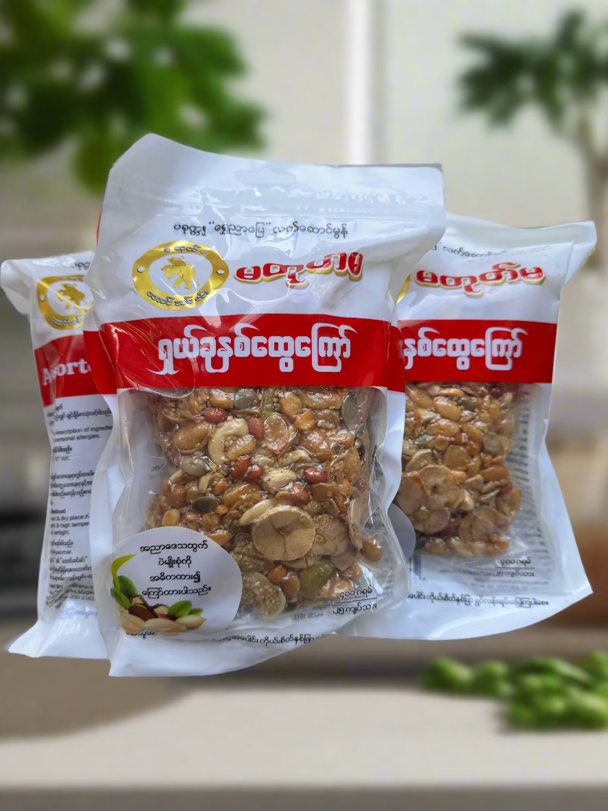 Three packages of a snack mix with visible brand logo on a white background
